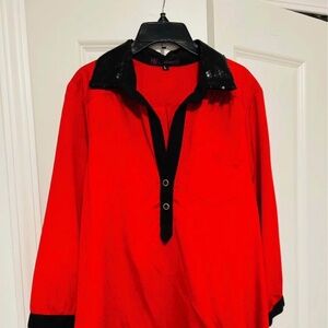 women red top with black collar